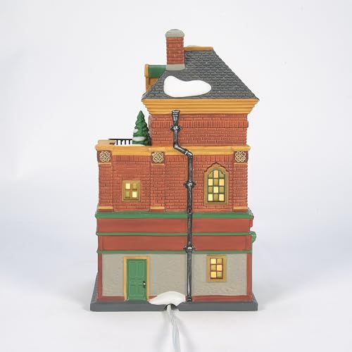 Decorative model of a two-story building with a chimney on a white background